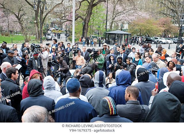Members of the New York City Council with their staff members and supporters wear 'hoodie' sweatshirts at a news conference on the steps of NY City Hall prior...