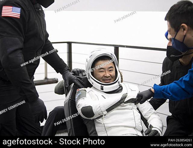 Japan Aerospace Exploration Agency (JAXA) astronaut Aki Hoshide poses for a photo after being helped out of the SpaceX Crew Dragon Endeavour spacecraft onboard...