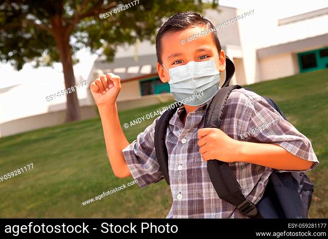 Hispanic Student Boy Wearing Face Mask with Backpack on School Campus