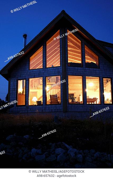 Nova Scotia Canada, illuminated wooden summerhouse at dawn