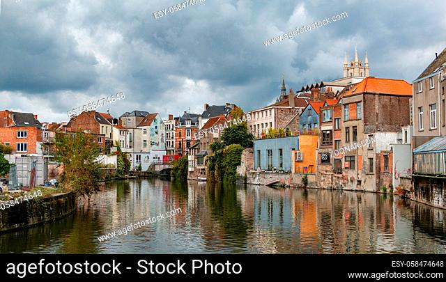 A picture of facades of buildings next to the canals of Ghent