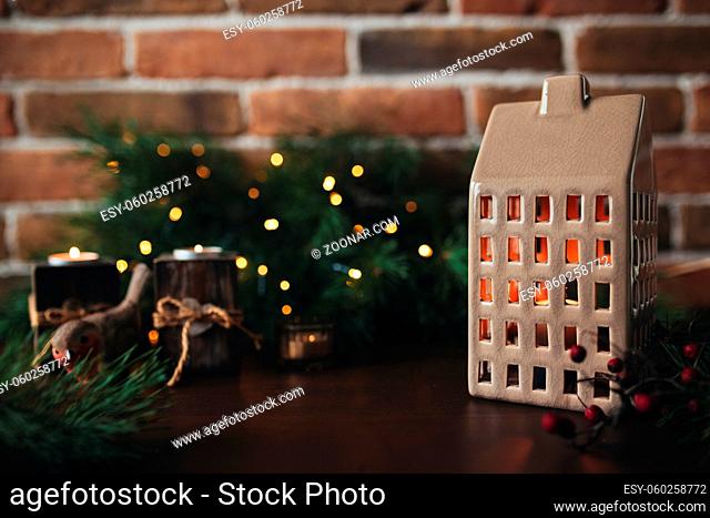 Christmas vintage candles and candlestick, christmas lights, christmas tree. High quality photo