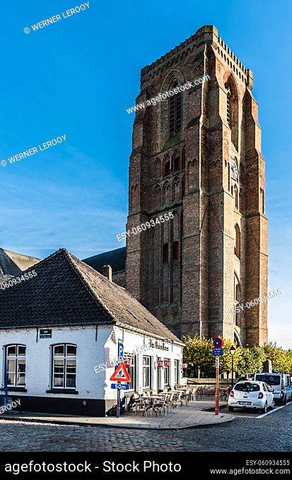 Lissewege, Flanders / Belgium: Scenic view over the old marked square and the tower of the Church of Our Lady of the Visitation