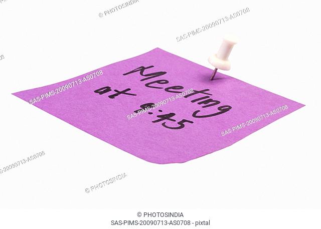 Word Meeting written on an adhesive note