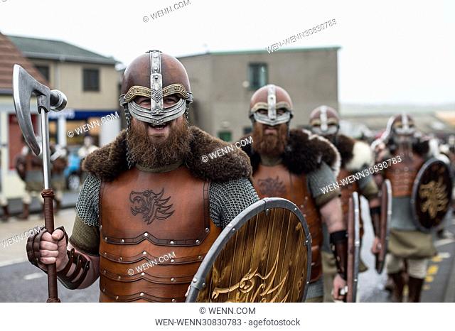 The Guizer Jarl and his squad sing songs at the Lerwick Royal British Region to parade through the town of Lerwick, Shetland