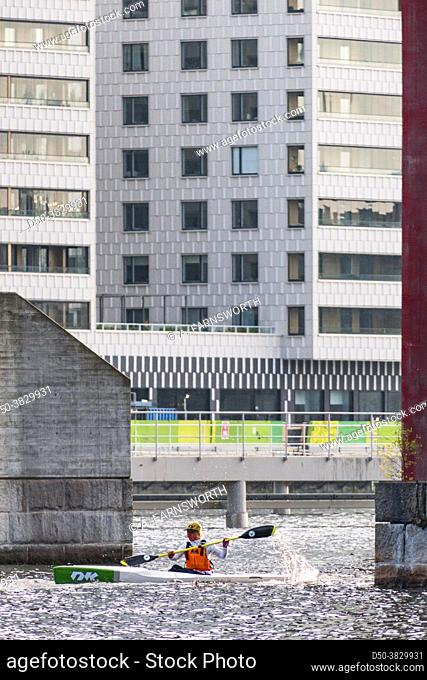 Stockholm, Sweden Kayakers under the Arsta bridge near Liljeholmen