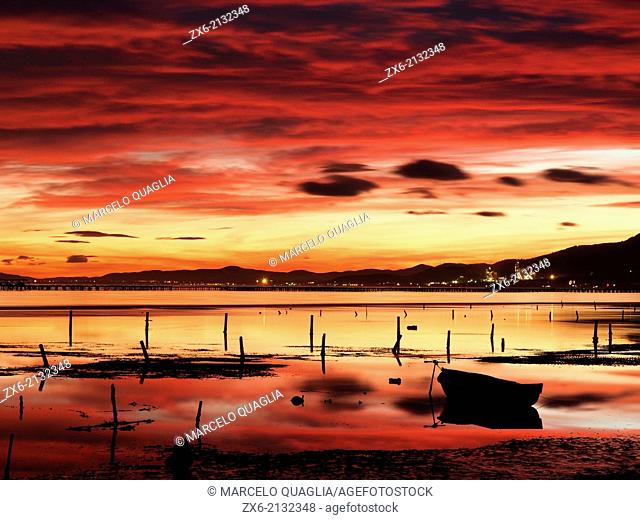 Alfacs Bay at dusk with mussel breeding sites. Ebro River Delta Natural Park, Tarragona province, Catalonia, Spain