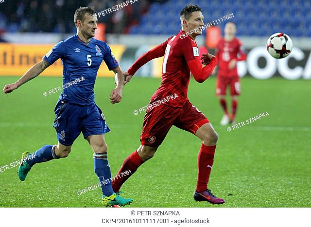 Maxim Medvedev of Azerbaijan, left, and Milan Skoda of Czech Republic in action during the Football World Cup 2018 group C qualifying match Czech Republic vs...