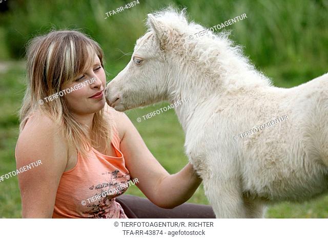 woman and Miniature Shetland Pony foal