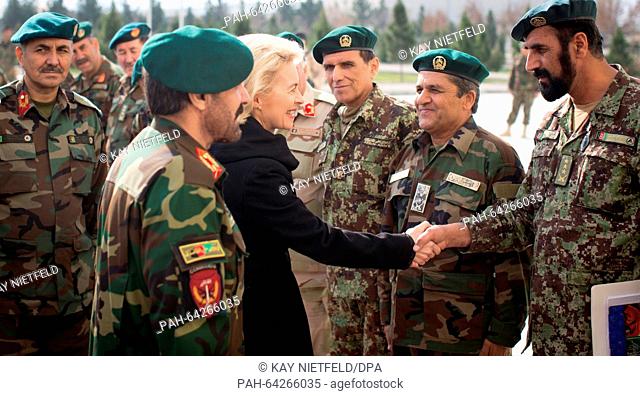 German Minister of Defence Ursula von der Leyen speaks with soldiers at Camp Shaheen, a field camp for the Afghan Army, near Mazar-i-Sharif, Afghanistan