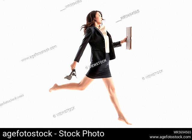 Running jump business young woman