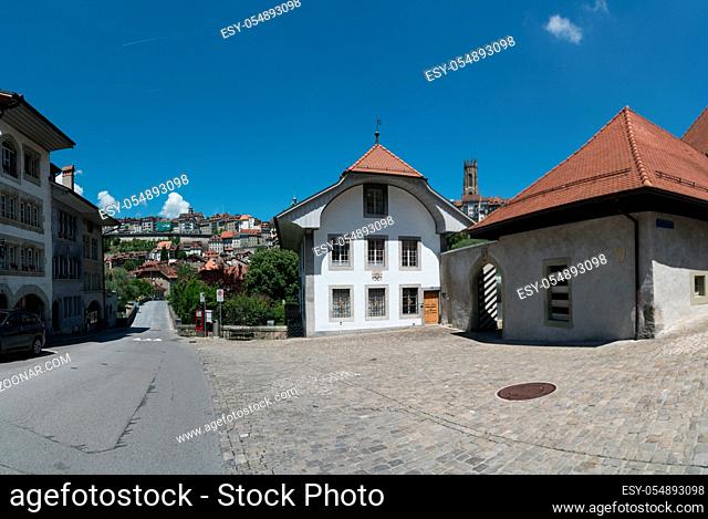 Fribourg, FR / Switzerland - 30 May 2019: view of the historic Saint Jean church and bridge in the historic city of Fribourg