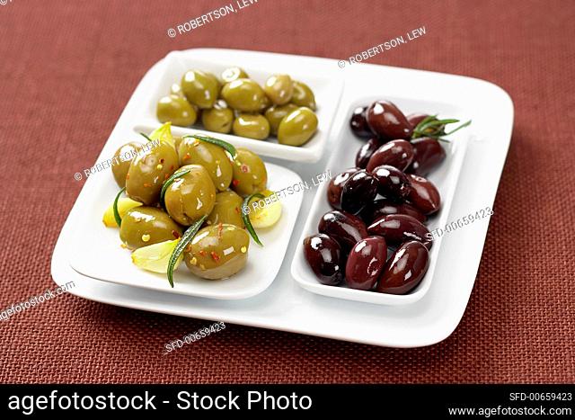 Three Assorted Olives on a White Platter