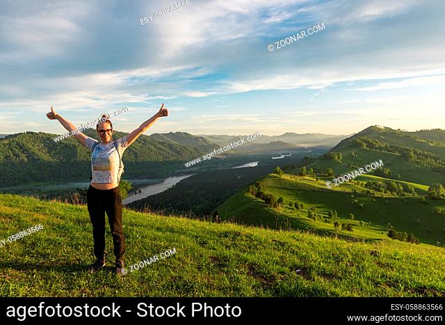 Travel, lesure and real life concept - woman in Altai mountain, beauty summer landcape