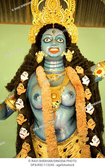 Statue of half naked goddess Durga face blue Idol ; small village district Manik gunj ; Bangladesh