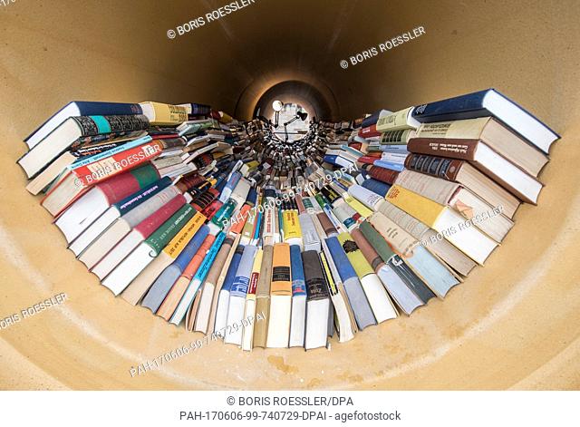 Books and reading lamps inside of the pipes of the installation by documenta aritst Hiwa K. can be seen during the documenta 14 event in Kassel, Germany