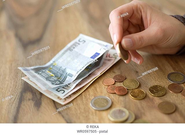 Woman counting money