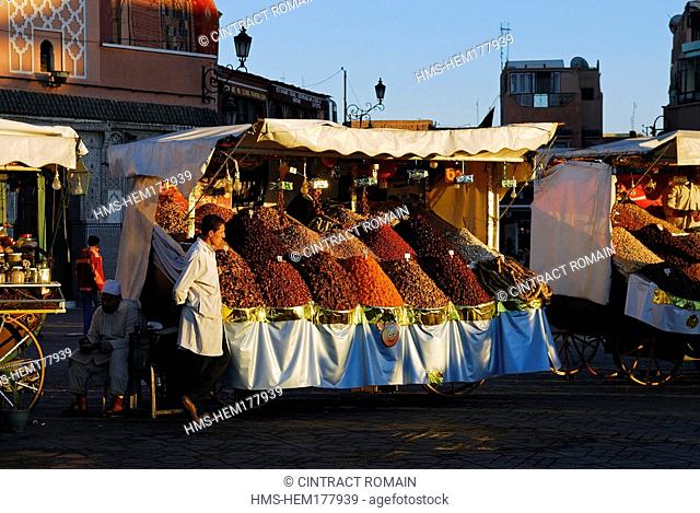 Morocco, High Atlas, Marrakesh, dried fruits salesman on Djemaa El Fna Square