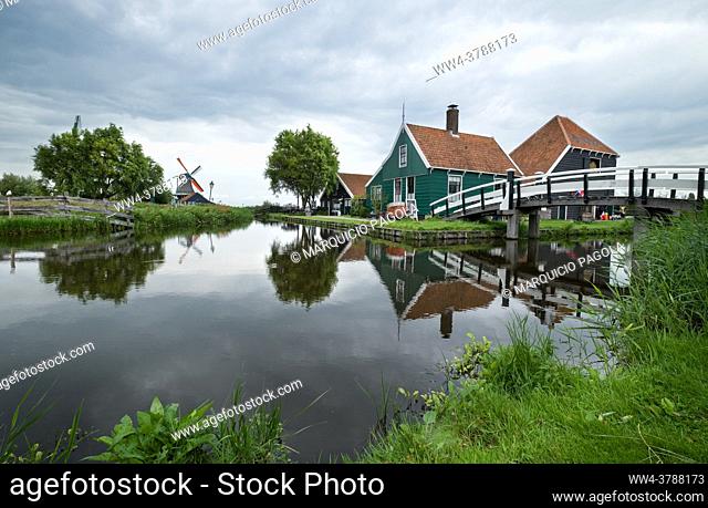 Classic view of the green houses and windmills in Zaanse Schans