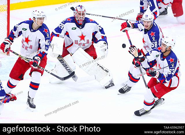 RUSSIA, ST PETERSBURG - DECEMBER 21, 2023: CSKA's Roman Kalinichenko, Ivan Fedotov, Yegor Fateyev and Takhir Mingachyov (L-R) defend the net in a 2023/24 KHL...
