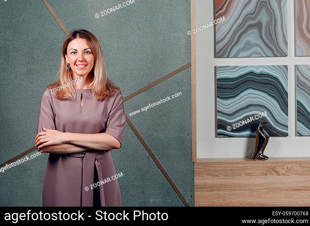 Business european woman young adult coach at office portrait pink dress