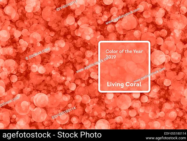 Living Coral color of the Year 2019. Bokeh background with coral in trendy color