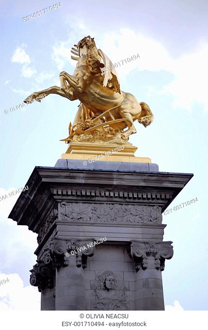 golden parisian statue