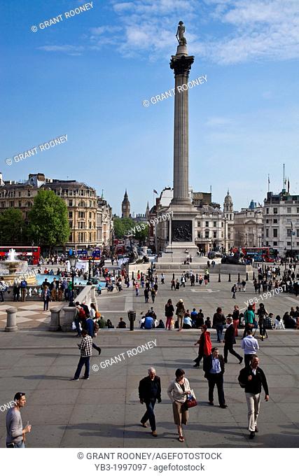 Tourists in Trafalgar Square, London, England