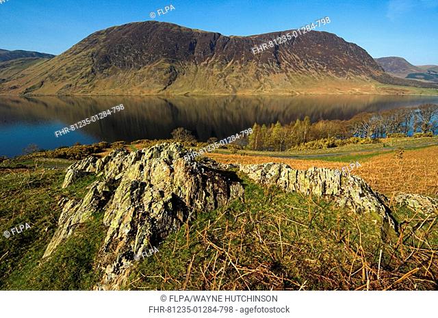 Mellbreak reflected in Crummock Water, Lake District, Cumbria, England, spring