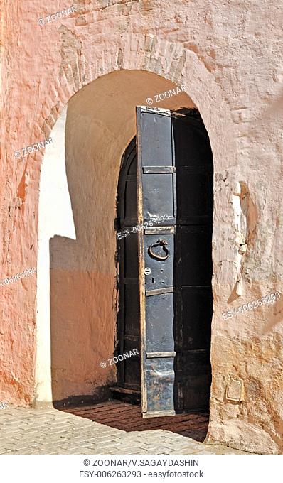Metal door in ancient russian monastery