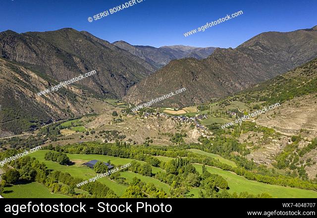 Aerial view of the town of Montesclado and the surrounding green fields, in Coma de Burg valley (Pallars SobirÃ , Lleida, Catalonia, Spain, Pyrenees)