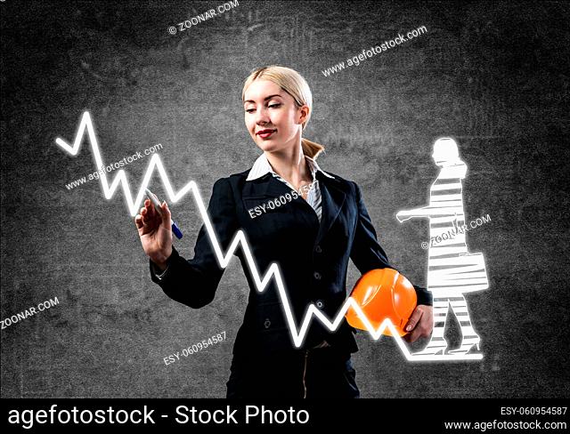 Business lady drawing success graph of professional career. Strategy planning and development of personal growth. HR specialist in business suit with safety...