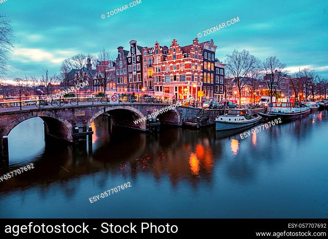 Amsterdam Netherlands canals with lights during evening in December during wintertime in the Netherlands Amsterdam city. Europe