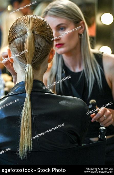 06 September 2022, Berlin: Models are made up backstage before the show of Kilian Kerner at the Mercedes-Benz Fashion Week at the Telegraphenamt on the occasion...