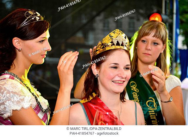 The Thuringian Wine Princess of 2012/2013, Jenny Meinhardt (R), and the 5th Wine Princess of Zeitz, Daniela Undeutsch (L)