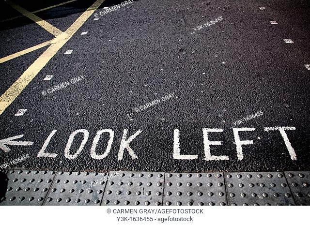 Pavement signal to look left
