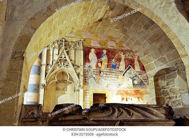 Recumbent effigy of Bishop Henri de Severy with in background mural painting from early 15th century on the north wall of the Choir