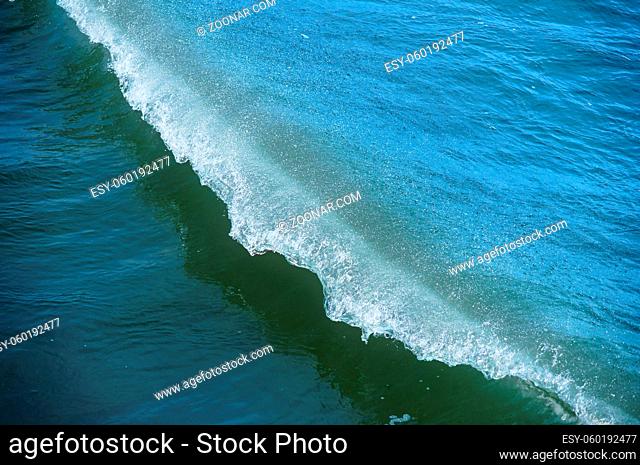 sea wave coast of the Baltic sea, blue sea, waves beat on the rocks