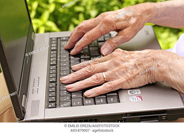 Old woman and laptop