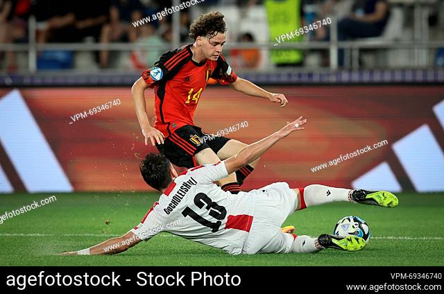 Georgia's Giorgi Gocholeishvili and Belgium's Maxim De Cuyper fight for the ball during the second game of the group stage (group A) between Georgia and Belgium...