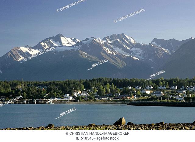 View of the village of Haines surronded by mountains and situated at the sea Alaska USA