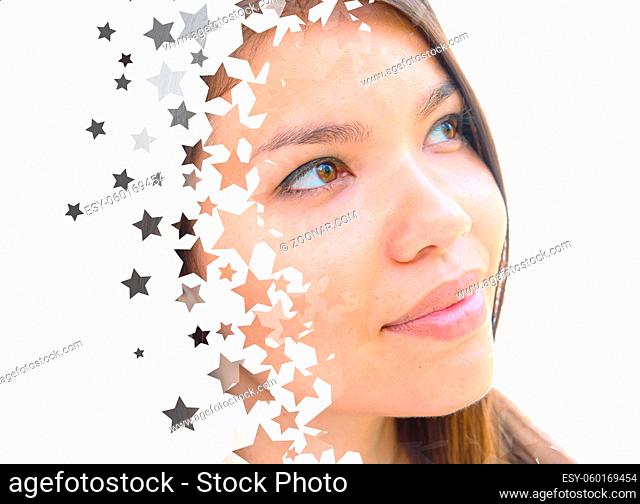 Bright portrait of a young lady combined with an image of countless stars