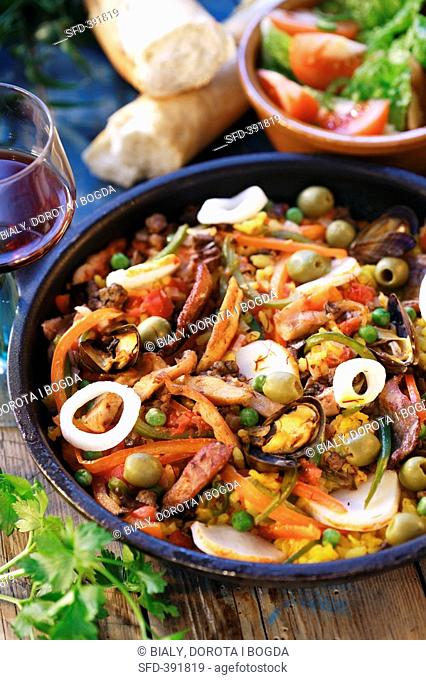 Paella with seafood and rabbit