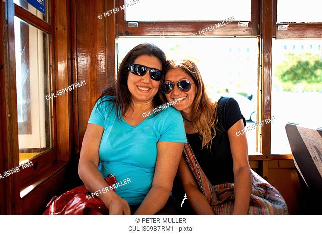 Women travelling on tram, Lisbon, Portugal