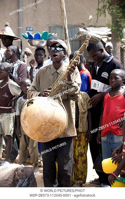 Mali, Djenne, Musician Outside The Djenne Mosque Date: 08 04 2008 Ref: ZB573-112045-0001 COMPULSORY CREDIT: World Pictures/Photoshot