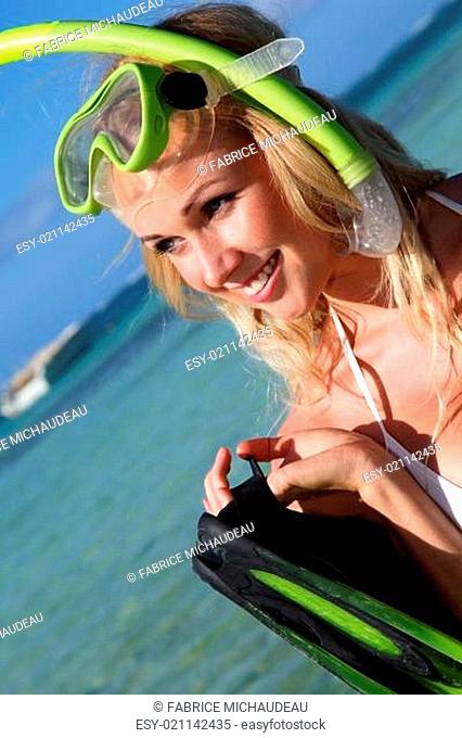 Smiling woman wearing snorkeling outfit