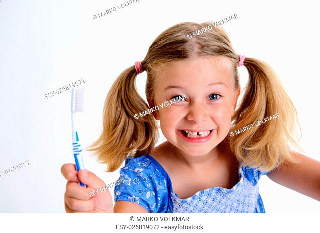 little funny girl with space width and toothbrush