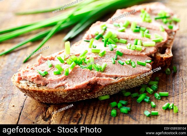A Piece Of Bread With Liver Pate And Chives