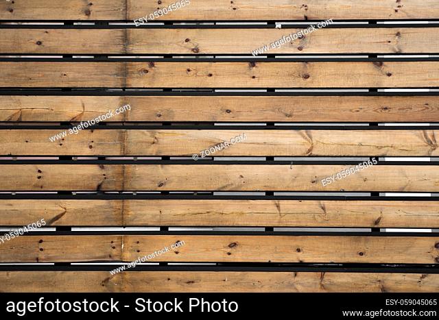 Horizontal rustic weathered old painted wood background with knots and nail holes. Woods texture