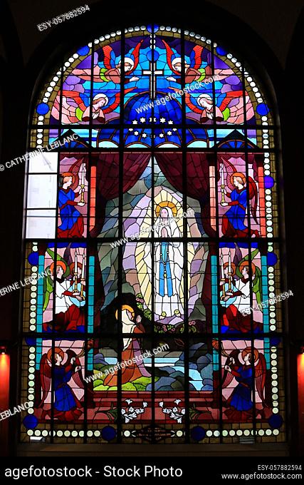 Appearance of the Virgin to Catherine Labouré. Stained glass. Church of Our Lady of Lourdes. St. Nicholas ans St. Mark Church. Ville d'Avray